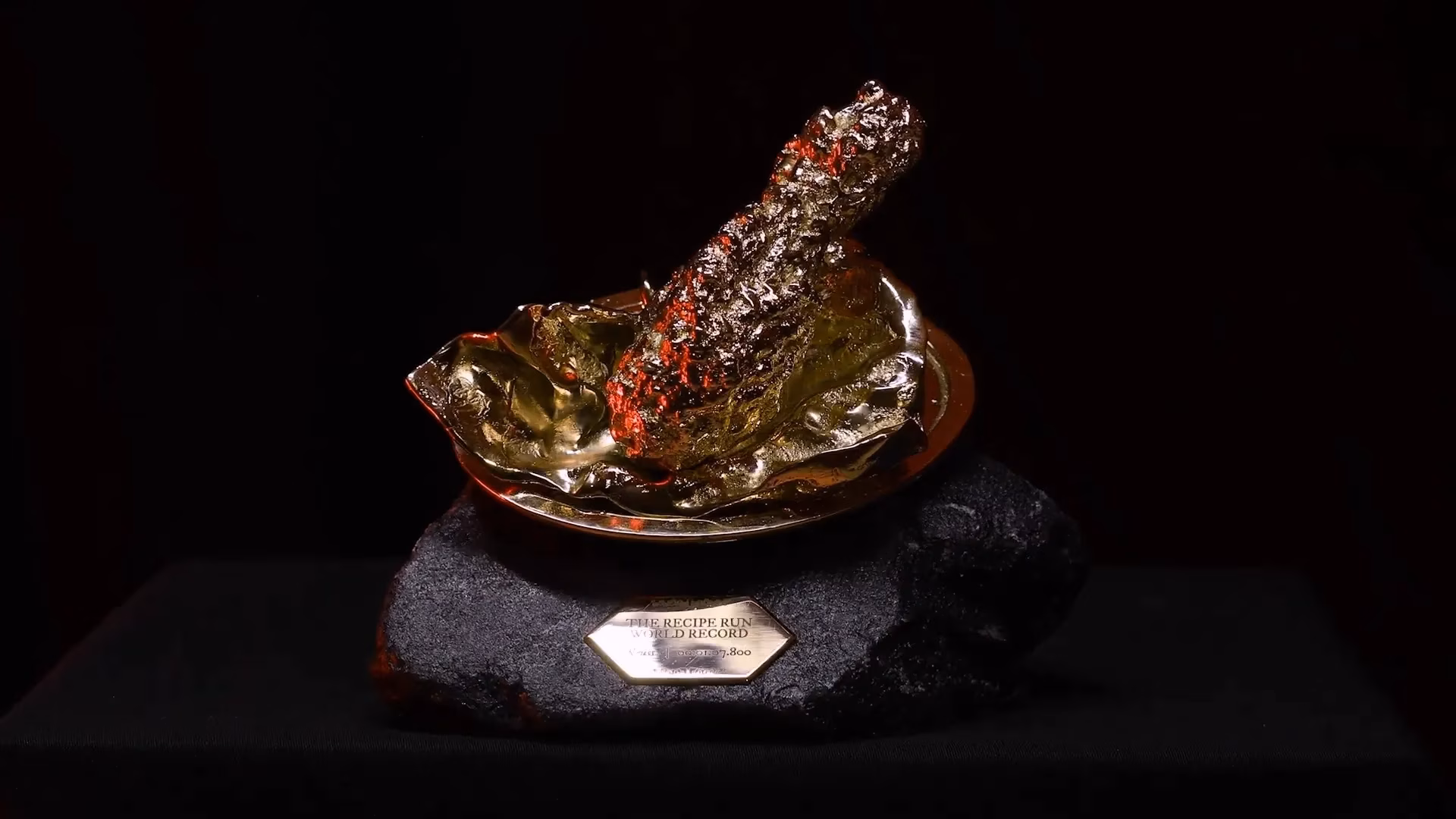 kfc-crowns-tears-of-the-kingdom-speedrun-winner-with-a-golden-drumstick-trophy-image-1